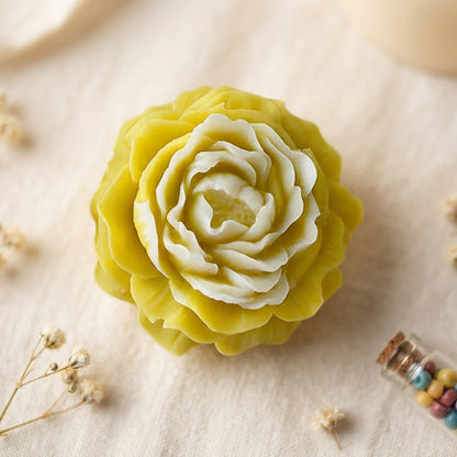 Decorative scented wax flower freshener in warm, comforting scents