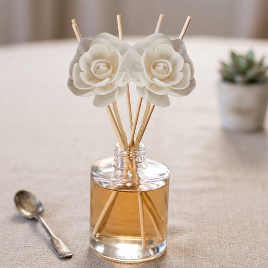 Reed diffuser bottle with reeds — Warm & Cozy collection in creamy vanilla, amber and toasted marshmallow scents